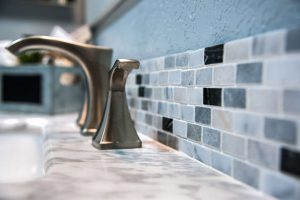 Should backsplash match shower tile?